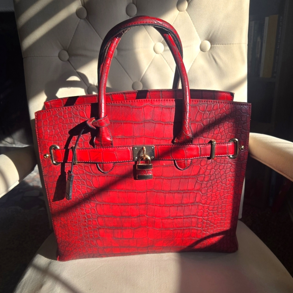 Faux, high-end designer look handbag